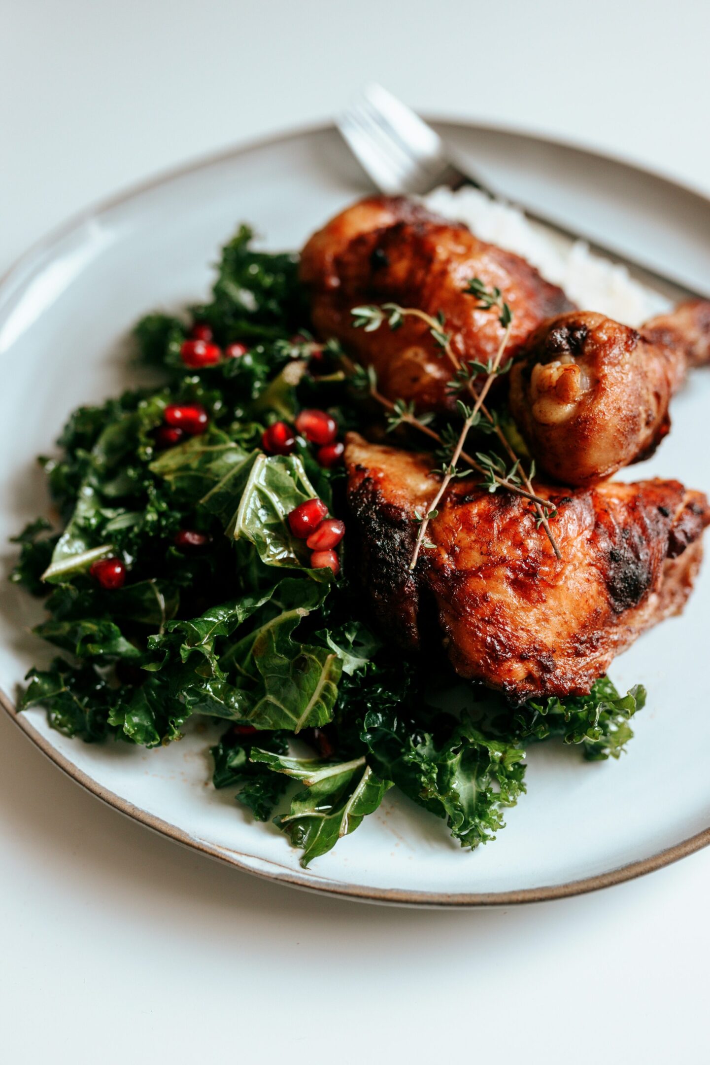 Plate with crispy fried chicken and kale salad.
